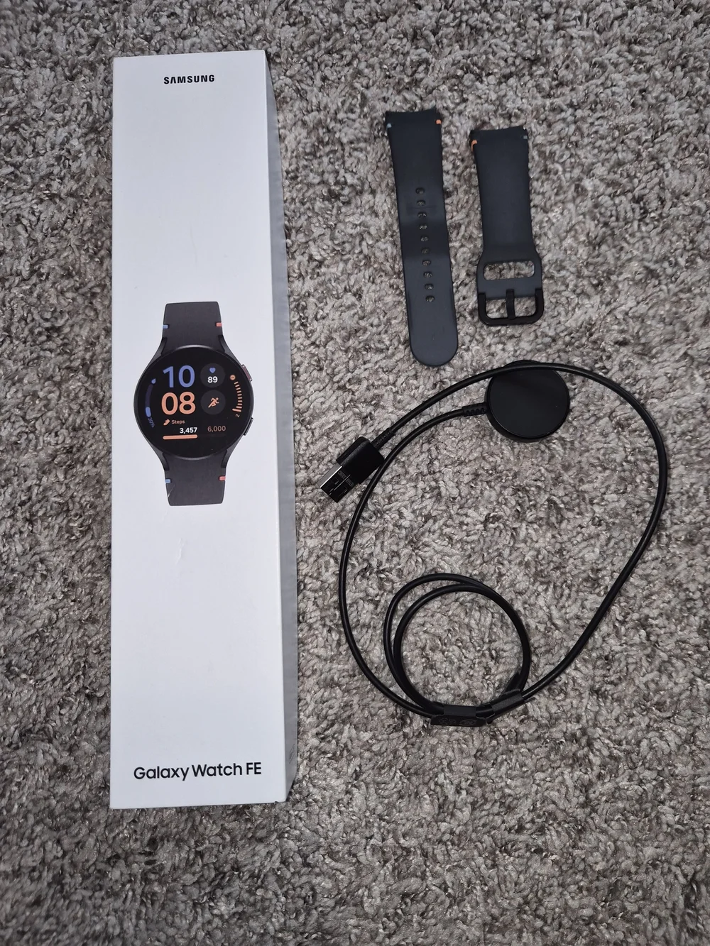 Samsung Galaxy Watch FE with Green Leather Strap and Gold Accents